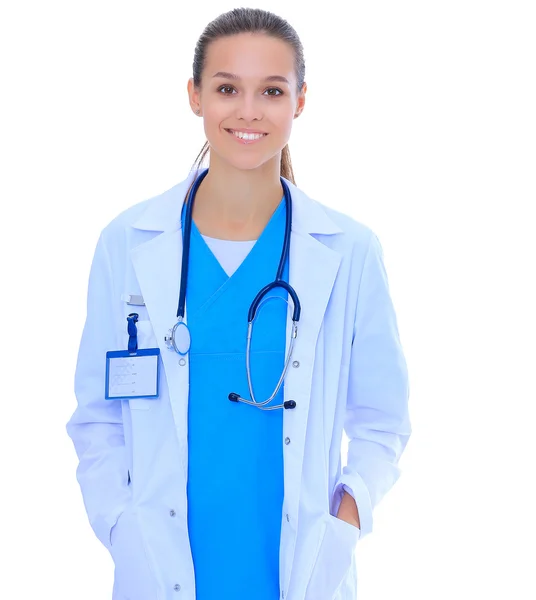 Beautiful young woman in white coat posing with hand in pocket. — Stock Photo, Image