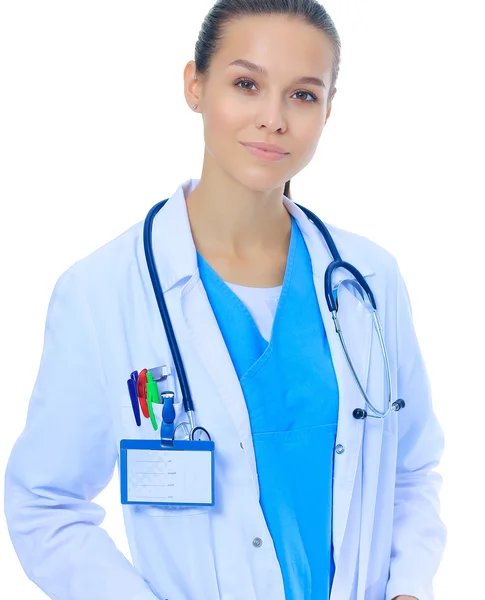 Beautiful young woman in white coat posing with hand in pocket. — Stock Photo, Image