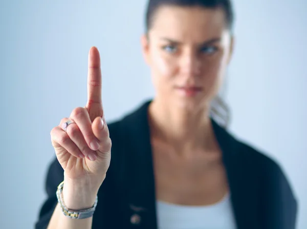 Frau berührt imaginären Bildschirm mit dem Finger — Stockfoto