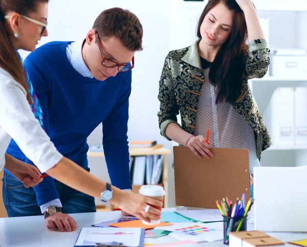 Young business people working at office on new project — Stock Photo, Image