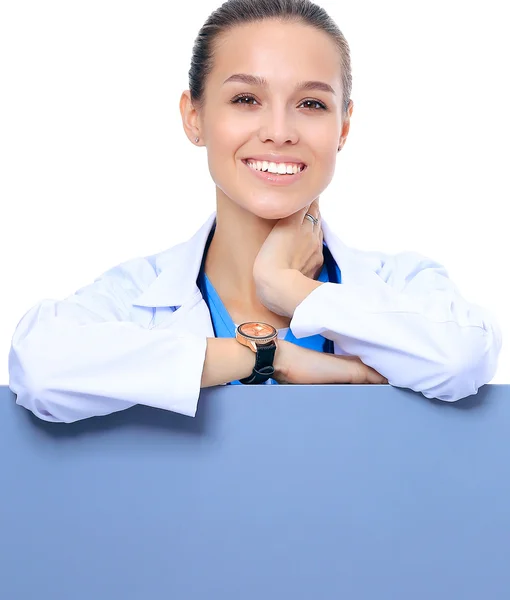 Una doctora con una cartelera en blanco. —  Fotos de Stock