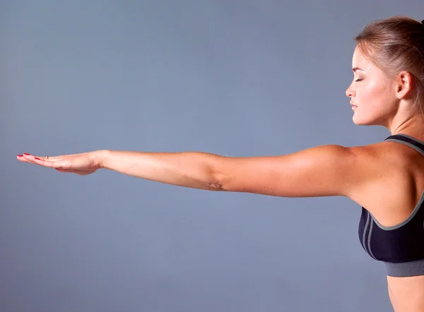 Portrait of sport girl doing yoga stretching exercise — Stock Photo, Image