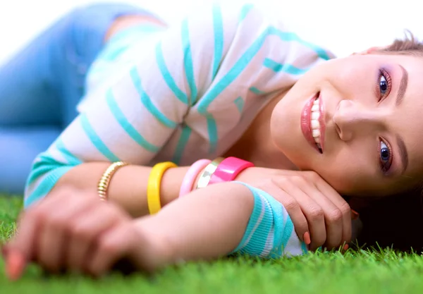 Top view of beautiful young woman holding hands behind head — Stock Photo, Image