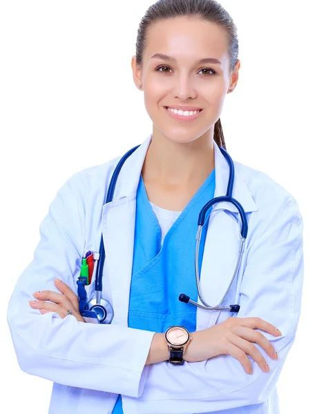 Woman doctor with stethoscope standing with arms crossed isolated on a white background — Stock Photo, Image