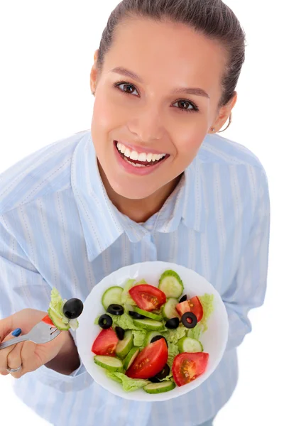 Una hermosa chica comiendo comida saludable — Foto de Stock