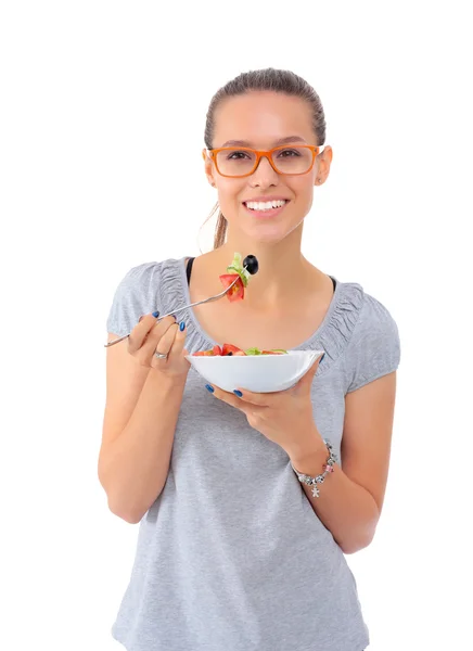 Una hermosa chica comiendo comida saludable — Foto de Stock