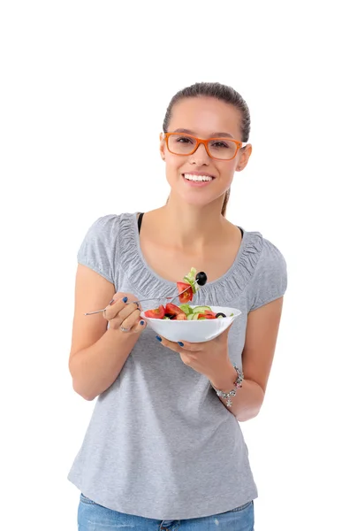 Una hermosa chica comiendo comida saludable — Foto de Stock