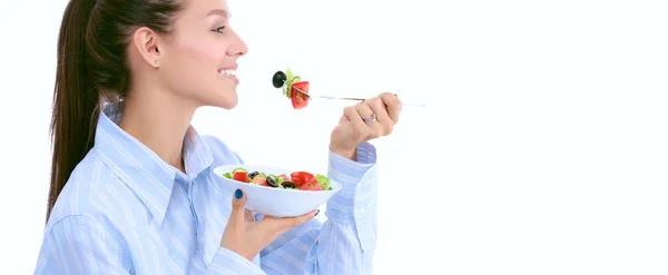 Una hermosa chica comiendo comida saludable — Foto de Stock