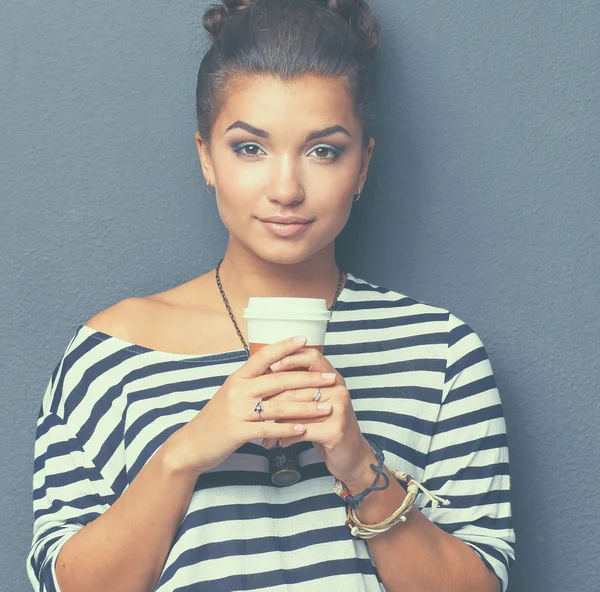 Portrait of  young woman with cup  tea or coffee — Stock Photo, Image