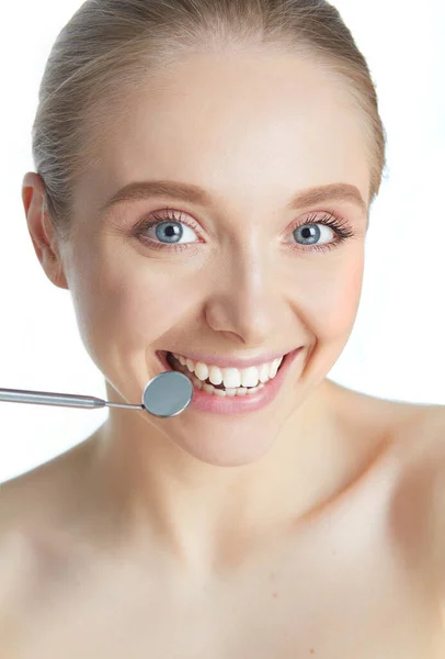 Denti donna e uno specchio bocca dentista — Foto Stock