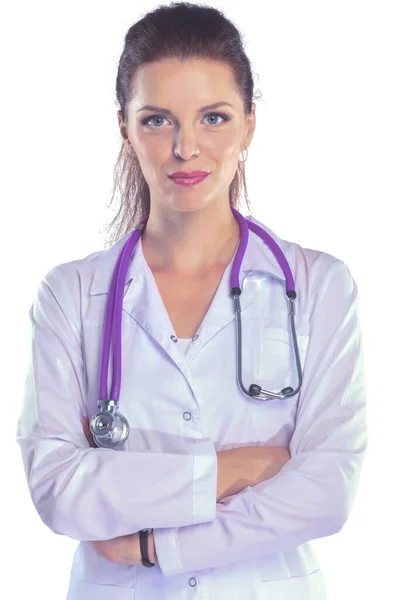 Retrato de una joven doctora con bata blanca de pie en el hospital. Retrato de una joven doctora — Foto de Stock