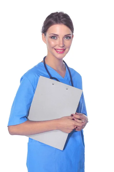 A female doctor with a folder, standing isolated on white background — Stock Photo, Image