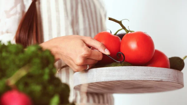 Young woman cooking in the kitchen. Young woman — Stock Photo, Image