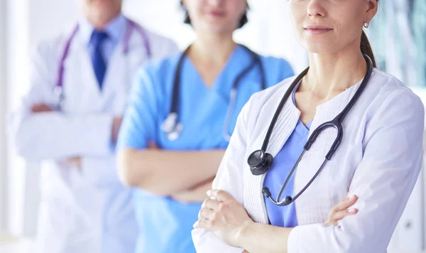 Group of doctors and nurses standing in the hospital Accident and Emergency department — Stock Photo, Image