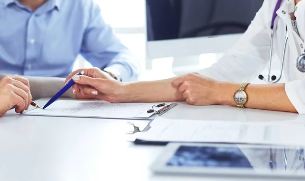 Close up of patient and doctor prescribing medication — Stock Photo, Image