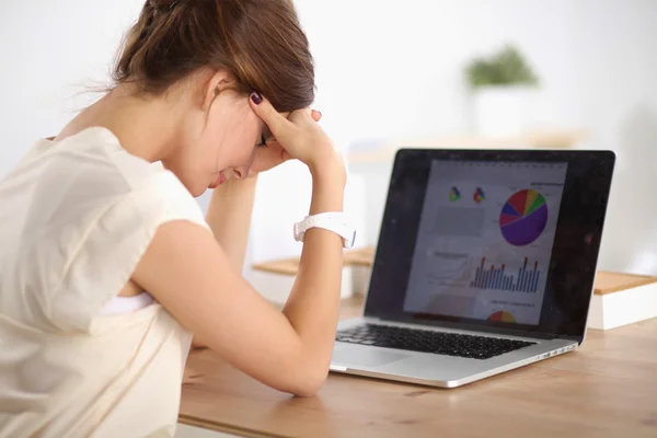 Young and beautiful businesswoman tired from work in the office — Stock Photo, Image