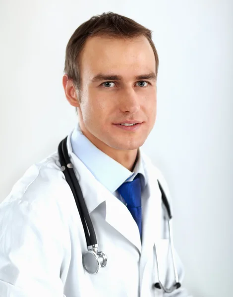 Portrait of young doctor with stethoscope isolated on white — Stock Photo, Image