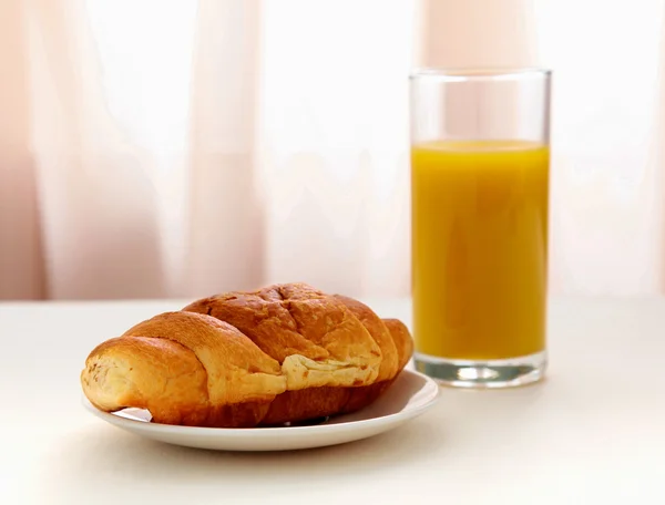 Croissants, Coffee, Orange Juice on table — Stock Photo, Image