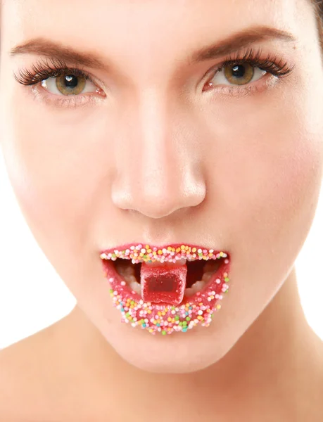 女人的嘴唇可爱甜蜜糖果 — 图库照片