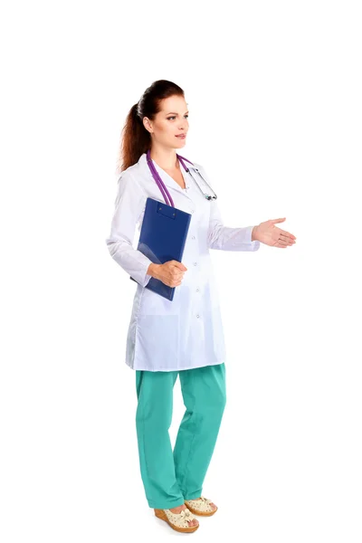 Smiling female doctor with a folder in uniform standing at hospital — Stock Photo, Image