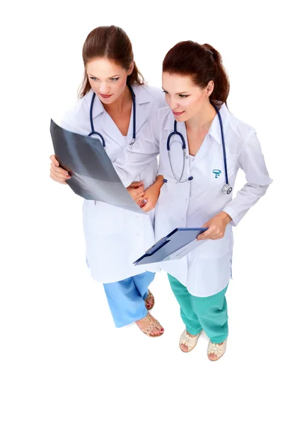 Two woman  nurse watching X Ray image, standing in hospital — Stock Photo, Image