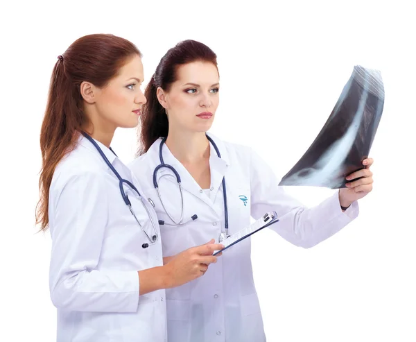 Two woman  nurse watching X Ray image, standing in hospital — Stock Photo, Image