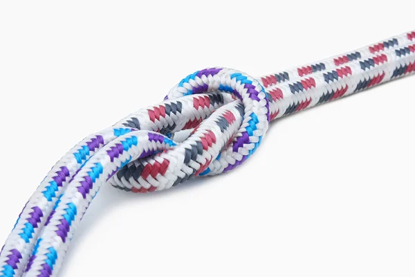 A rope with a knot on white — Stock Photo, Image