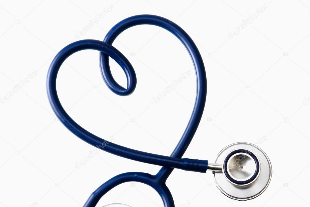 A stethoscope in the shape of a heart , isolated on white background