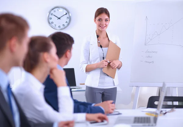 Business people sitting and discussing at business meeting, in office — Stock Photo, Image