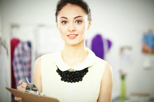 Modern young fashion designer working at studio. — Stock Photo, Image