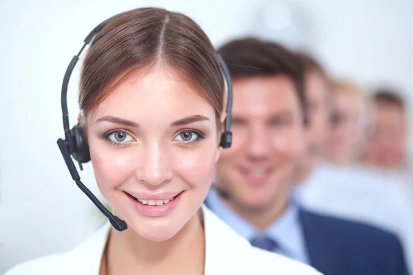 Attractive Smiling positive young businesspeople and colleagues in a call center office — Stock Photo, Image