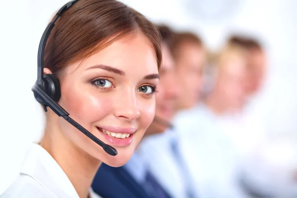 Attractive Smiling positive young businesspeople and colleagues in a call center office — Stock Photo, Image