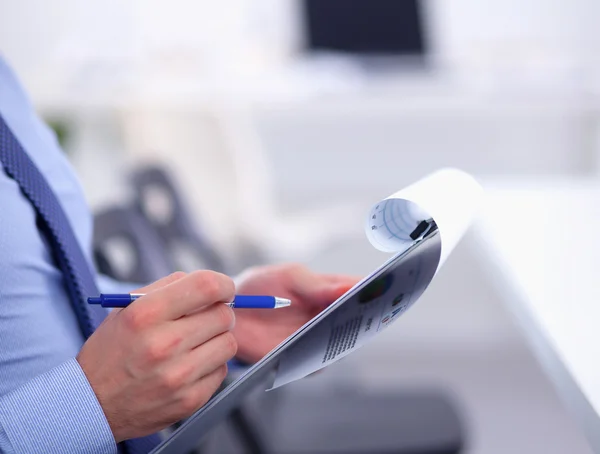 Business people sitting and writting at business meeting, in office — Stock Photo, Image