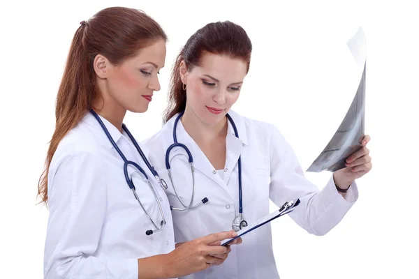 Two woman  nurse watching X Ray image, standing in hospital — Stock Photo, Image