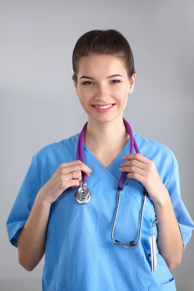 Portrait of happy successful young female doctor holding a stethoscope — Stock Photo, Image
