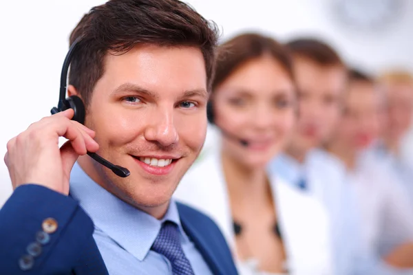 Attractive Smiling positive young businesspeople and colleagues in a call center office — Stock Photo, Image