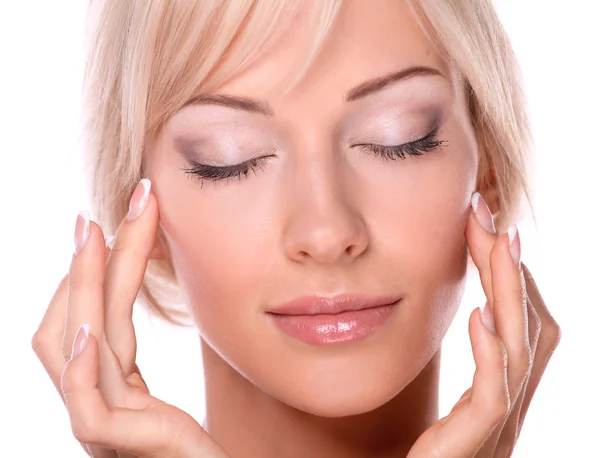 Portrait of young woman touching her face isolated on white background — Stock Photo, Image