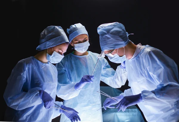 Team surgeon at work in operating room. — Stock Photo, Image