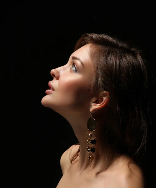 Portrait of beautiful young woman face. Isolated on dark background — Stock Photo, Image