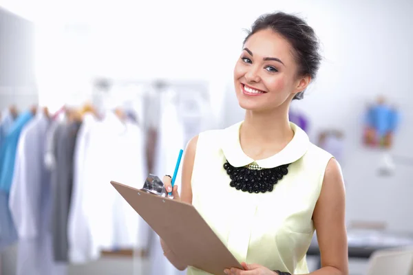 Modern young fashion designer working at studio. — Stock Photo, Image