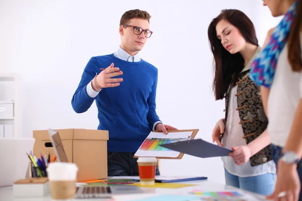 Young business people working at office on new project — Stock Photo, Image