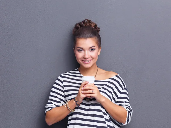 Portrait of  young woman with cup  tea or coffee — Stock Photo, Image