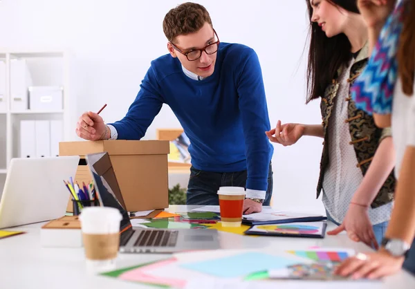 Young business people working at office on new project — Stock Photo, Image