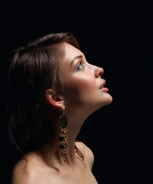 Portrait of beautiful young woman face. Isolated on dark background — Stock Photo, Image