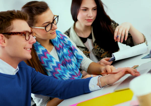 Young business people working at office on new project — Stock Photo, Image