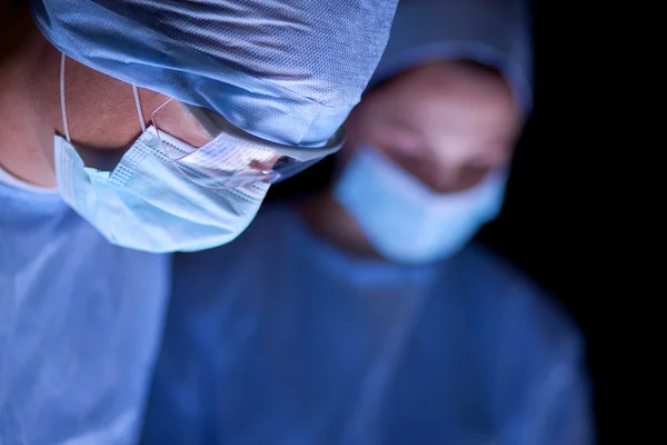 Team surgeon at work in operating room. — Stock Photo, Image