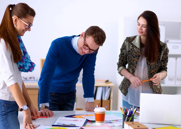 Young business people working at office on new project — Stock Photo, Image