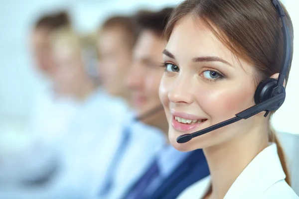Attractive positive young businesspeople and colleagues in a call center office — Stock Photo, Image