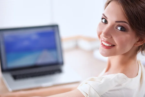 Beautiful  businesswoman enjoying coffee in bright office — Stock Photo, Image