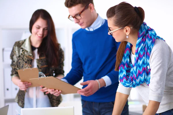 Young business people working at office on new project — Stock Photo, Image